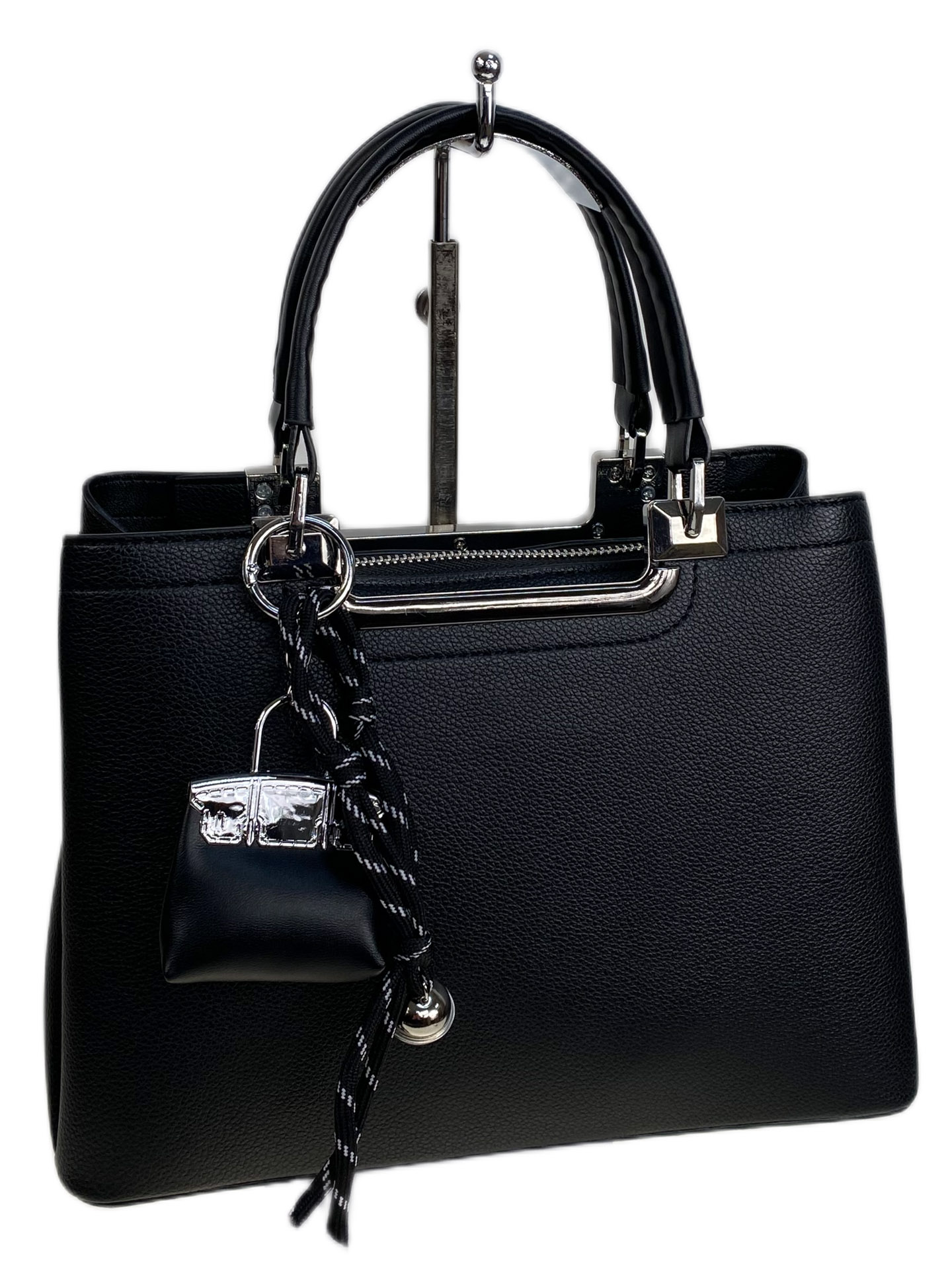 На фото 1 - Женская сумка из искусственной кожи, цвет черный