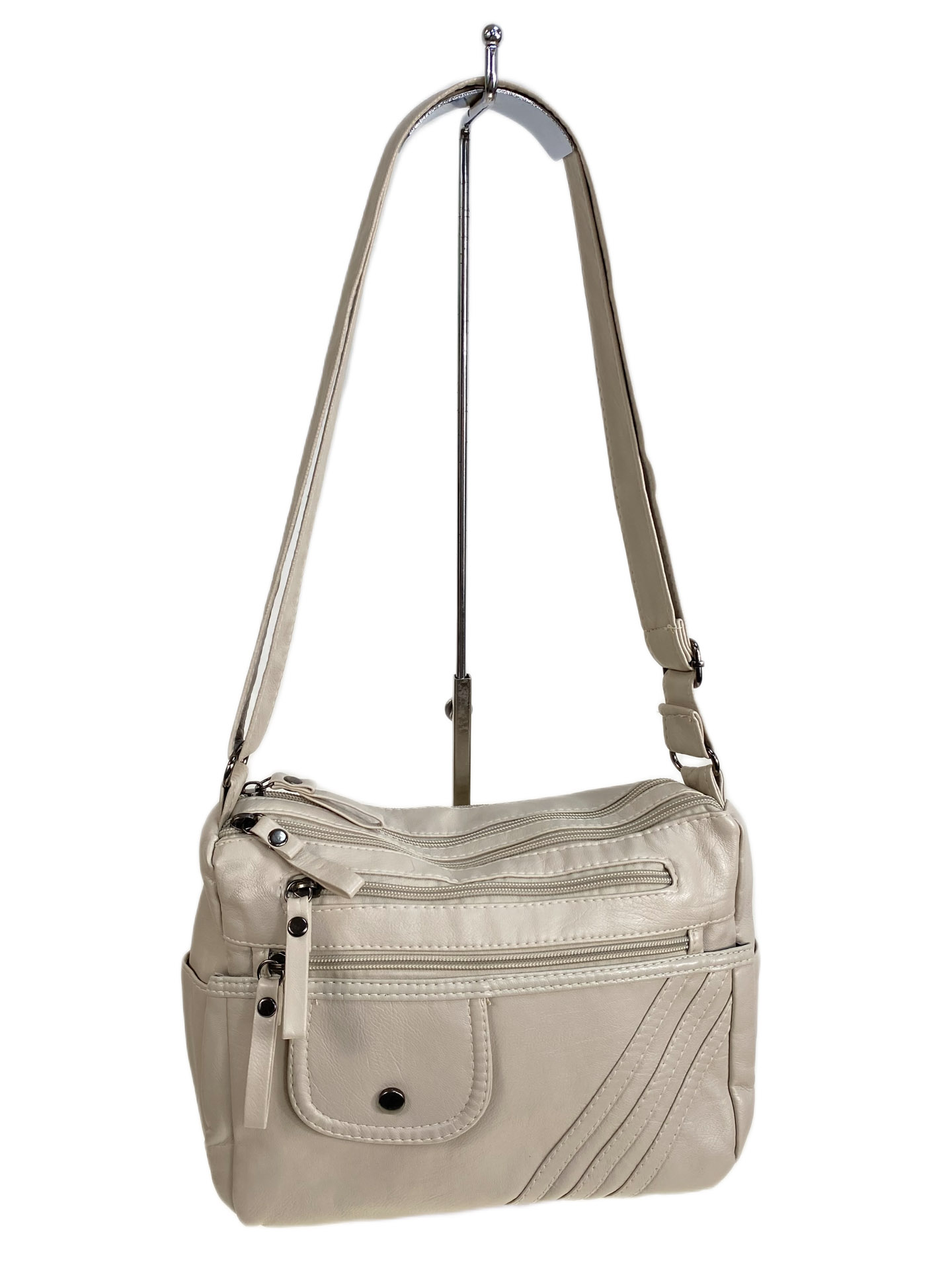 На фото 1 - Женская сумка из искусственной кожи, цвет молочный