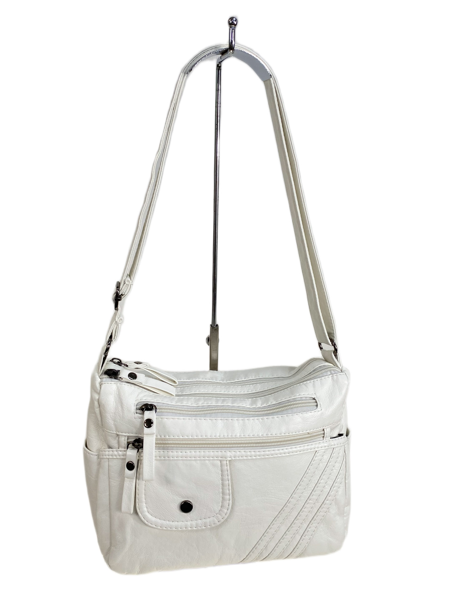 На фото 1 - Женская сумка из искусственной кожи, цвет белый