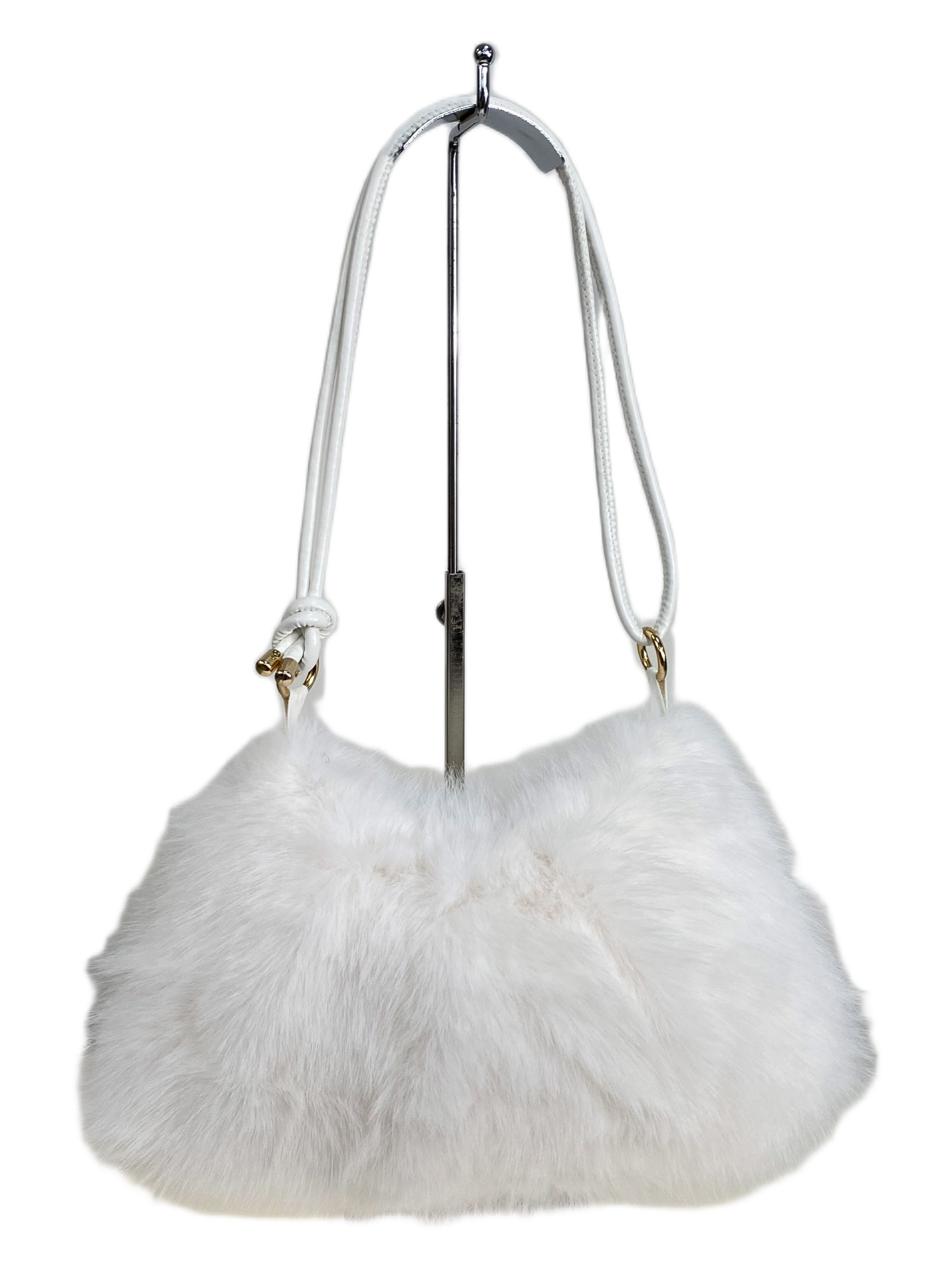 На фото 1 - Женская сумка из искусственного меха, цвет белый