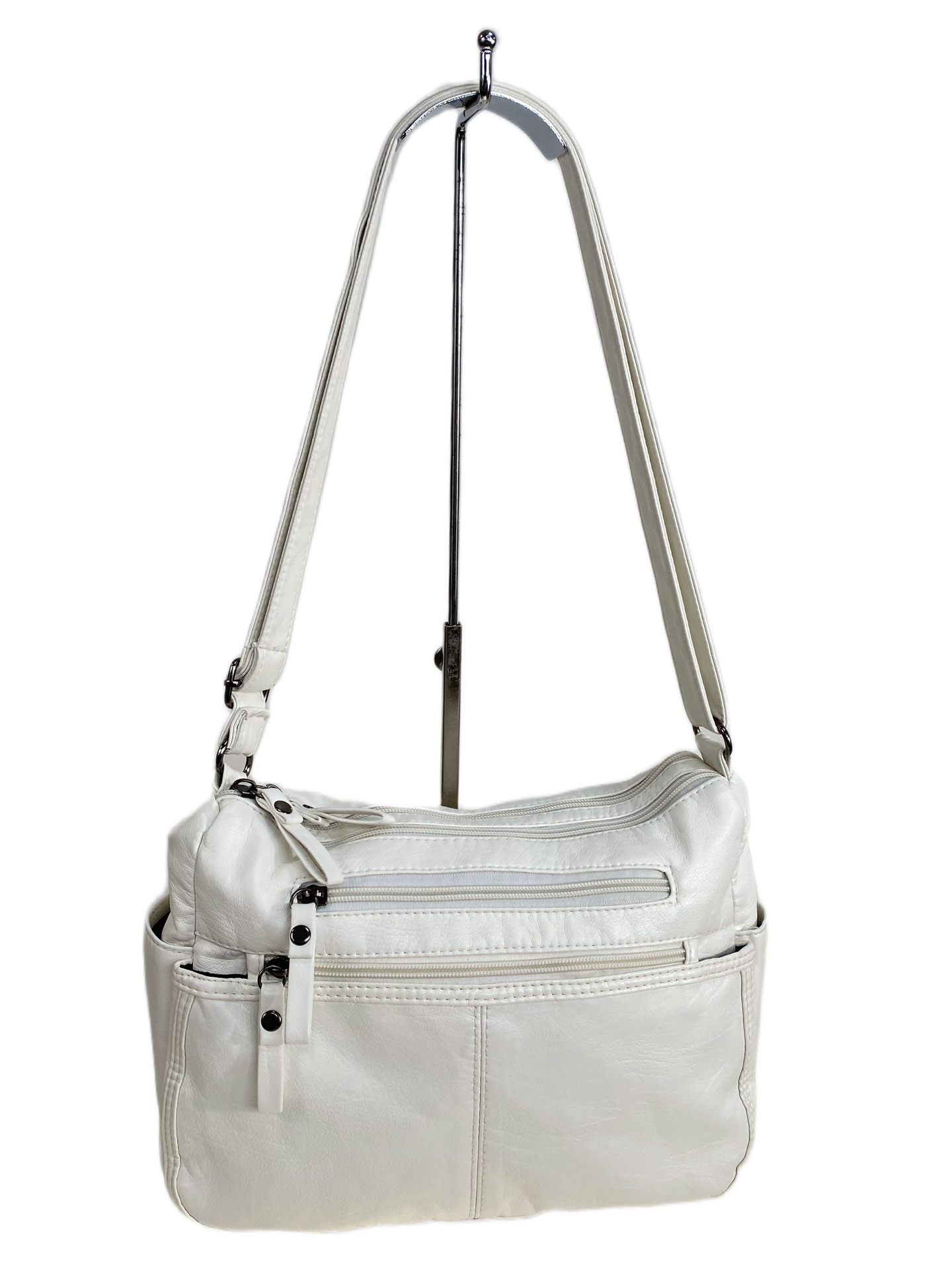 На фото 1 - Женская сумка из искусственной кожи, цвет белый