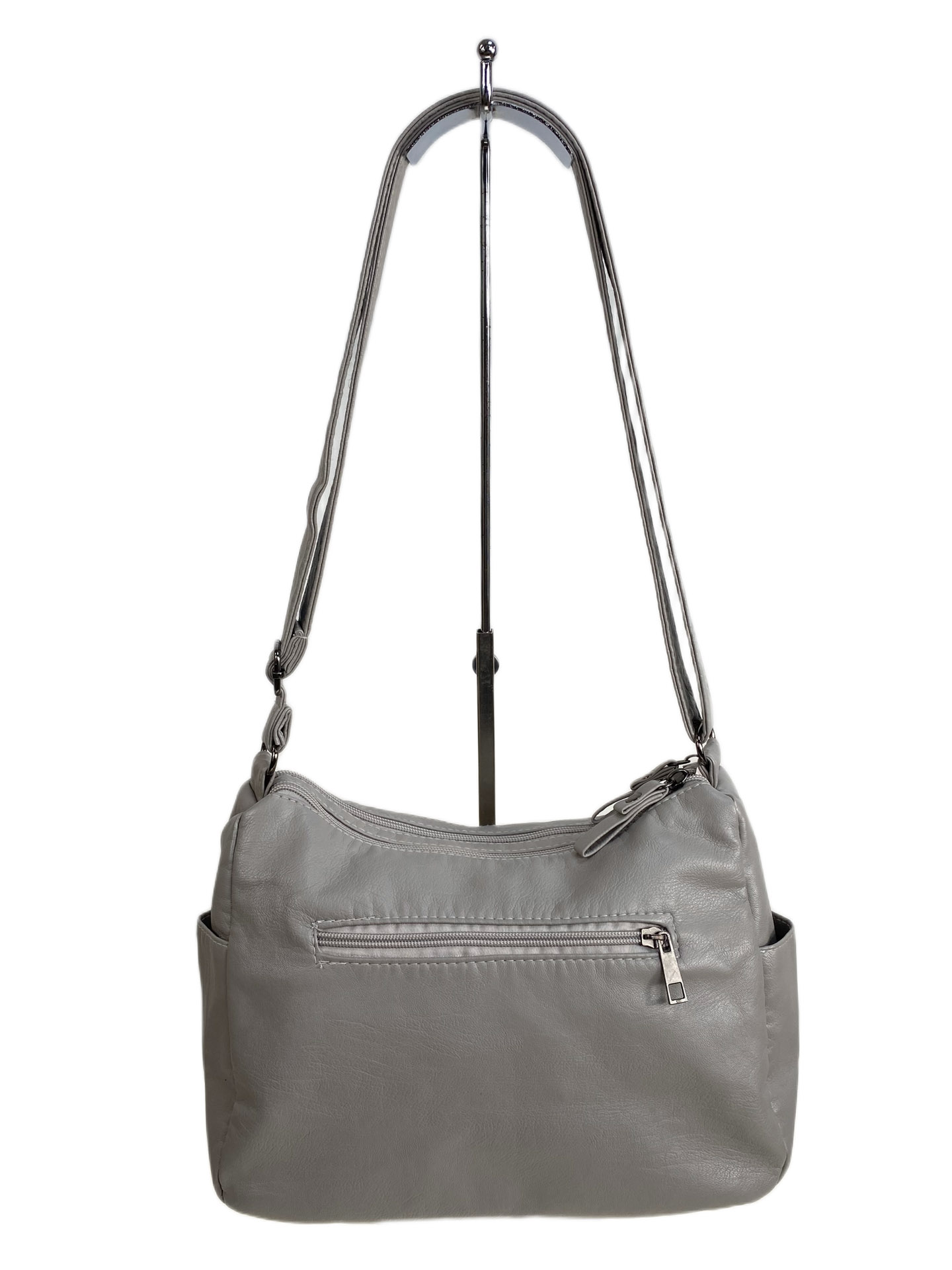 На фото 2 - Женская сумка из искусственной кожи, цвет светло серый