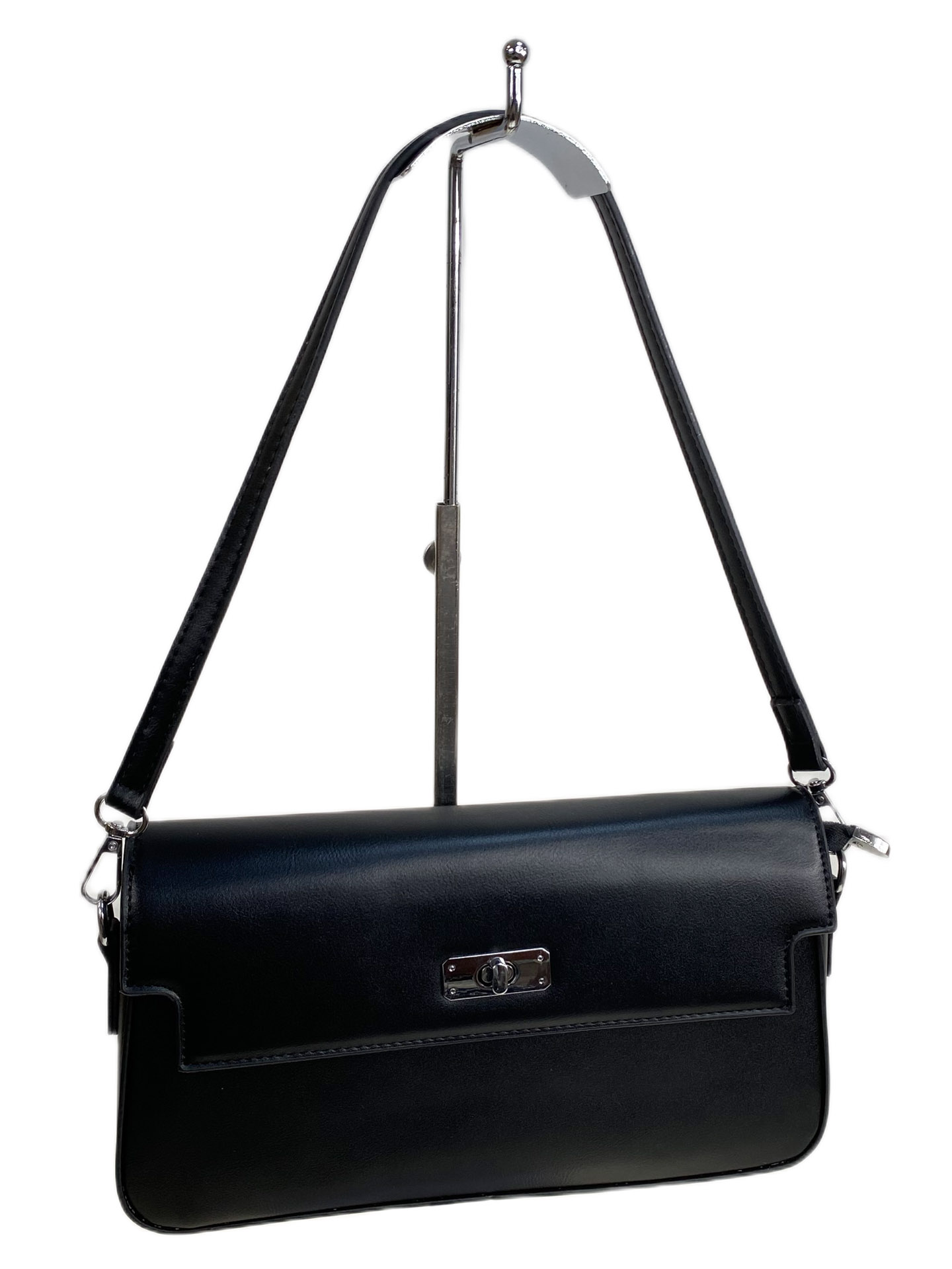 На фото 1 - Женская сумка из искусственной кожи, цвет черный