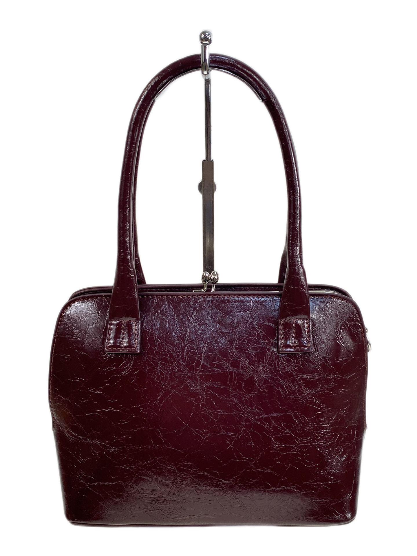 На фото 1 - Женская сумка из натуральной кожи, цвет бордовый