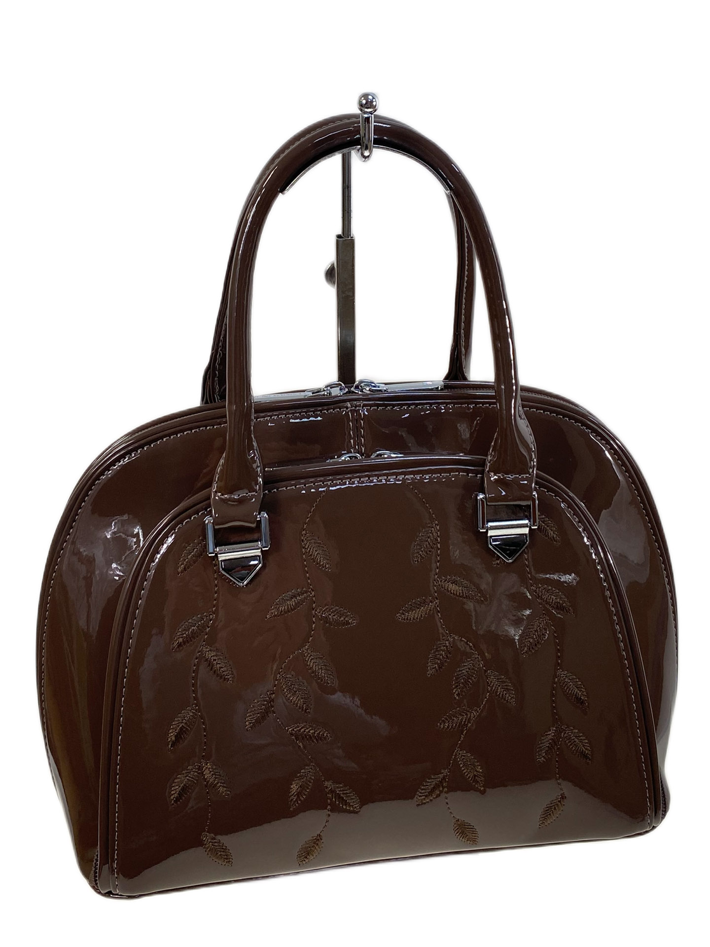 На фото 1 - Женская сумка из искусственной кожи, цвет шоколад