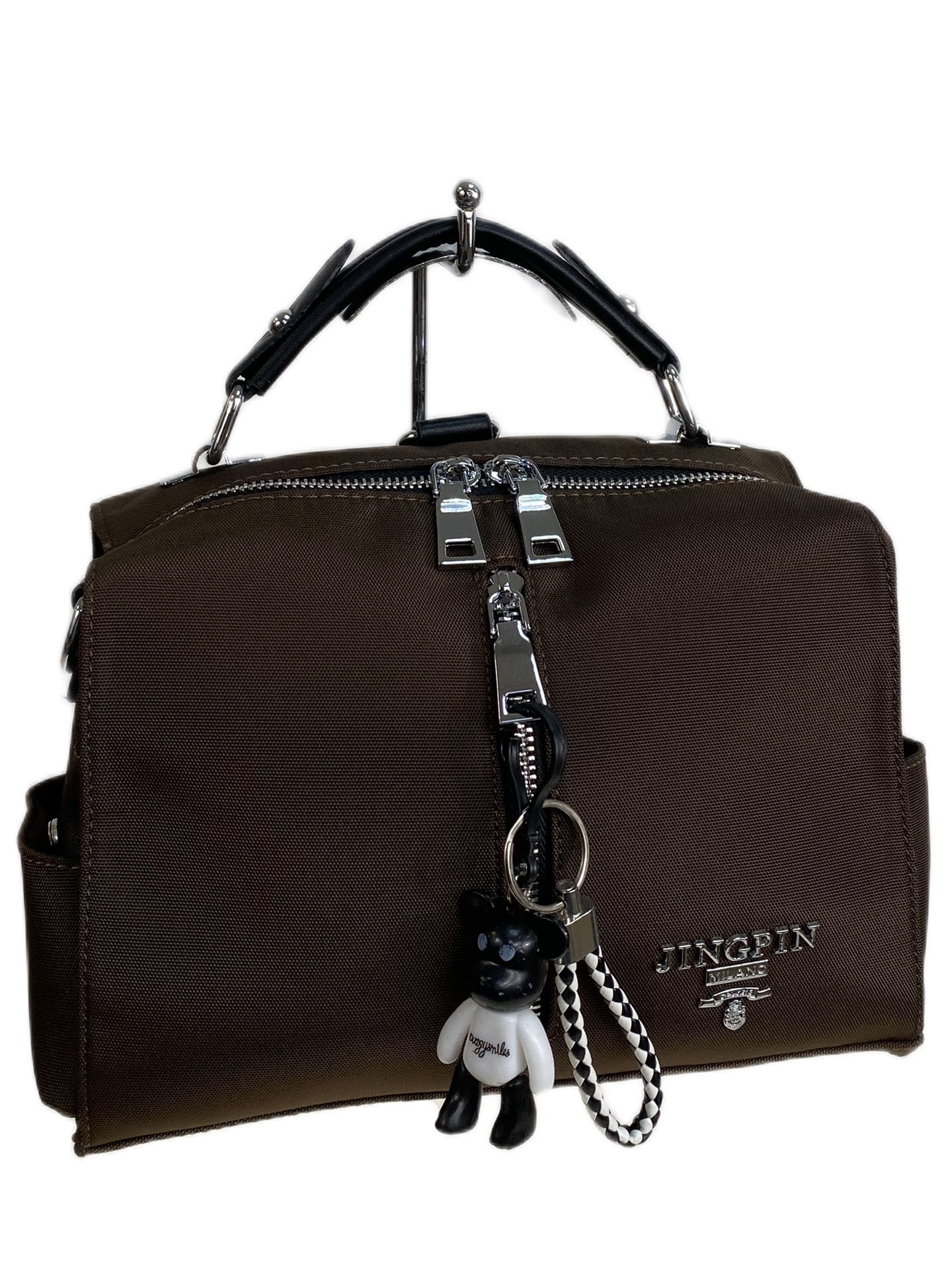 На фото 1 - Женская сумка-рюкзак из текстиля, цвет шоколад