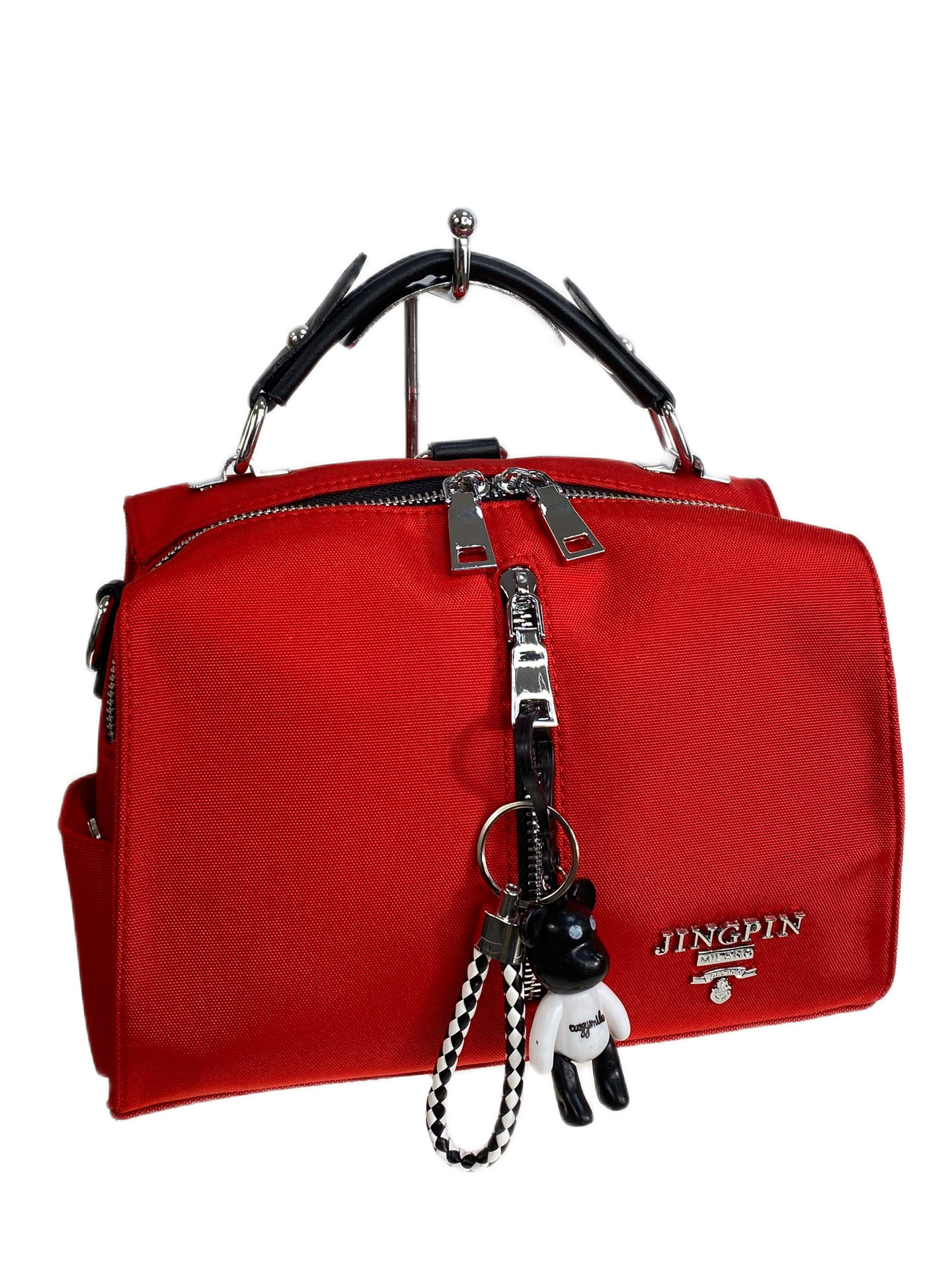 На фото 1 - Женская сумка-рюкзак из текстиля, цвет красный 