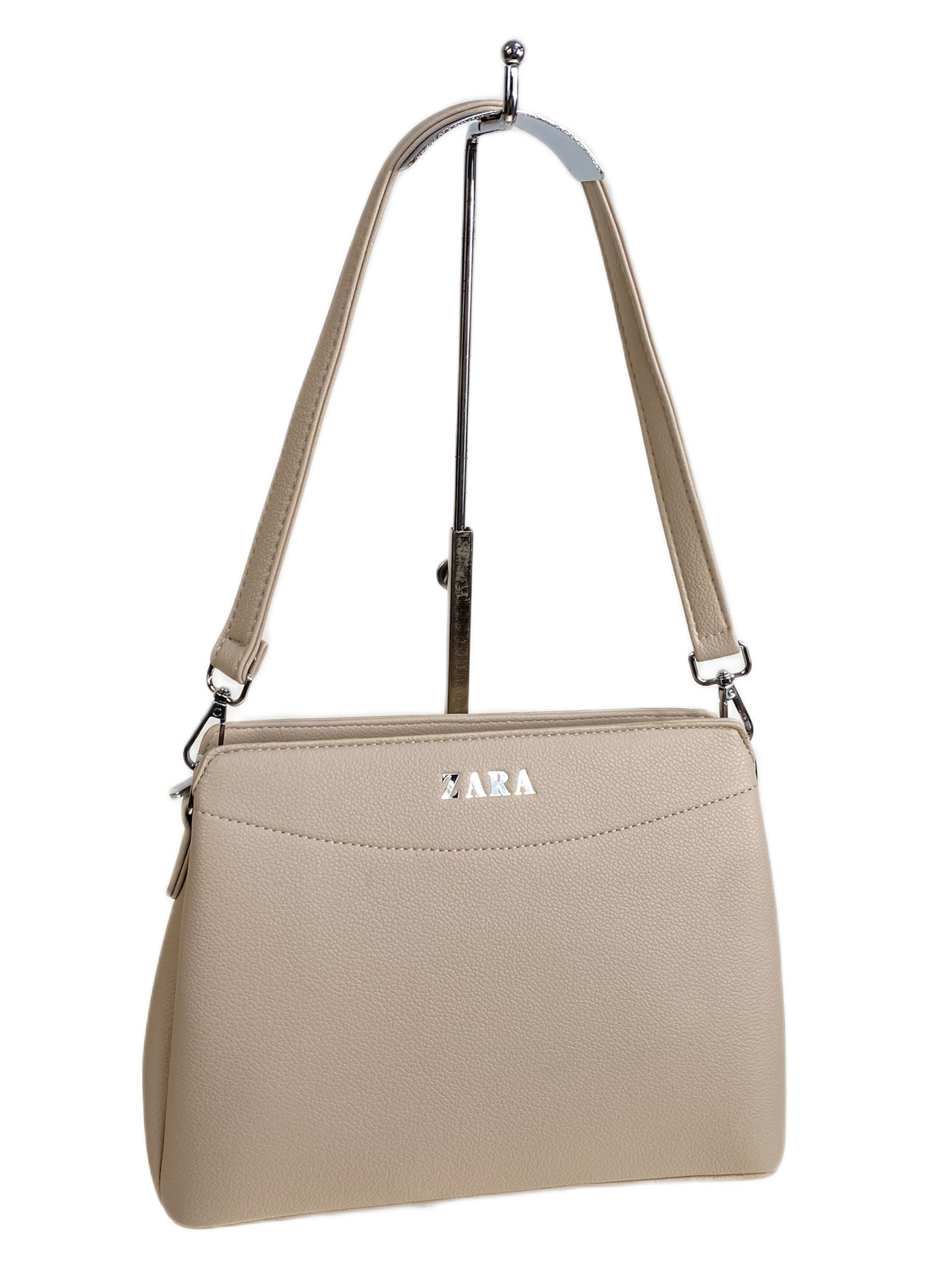 На фото 1 - Женская сумка из искусственной кожи, цвет молочный