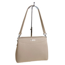 На фото 1 - Женская сумка из искусственной кожи, цвет молочный