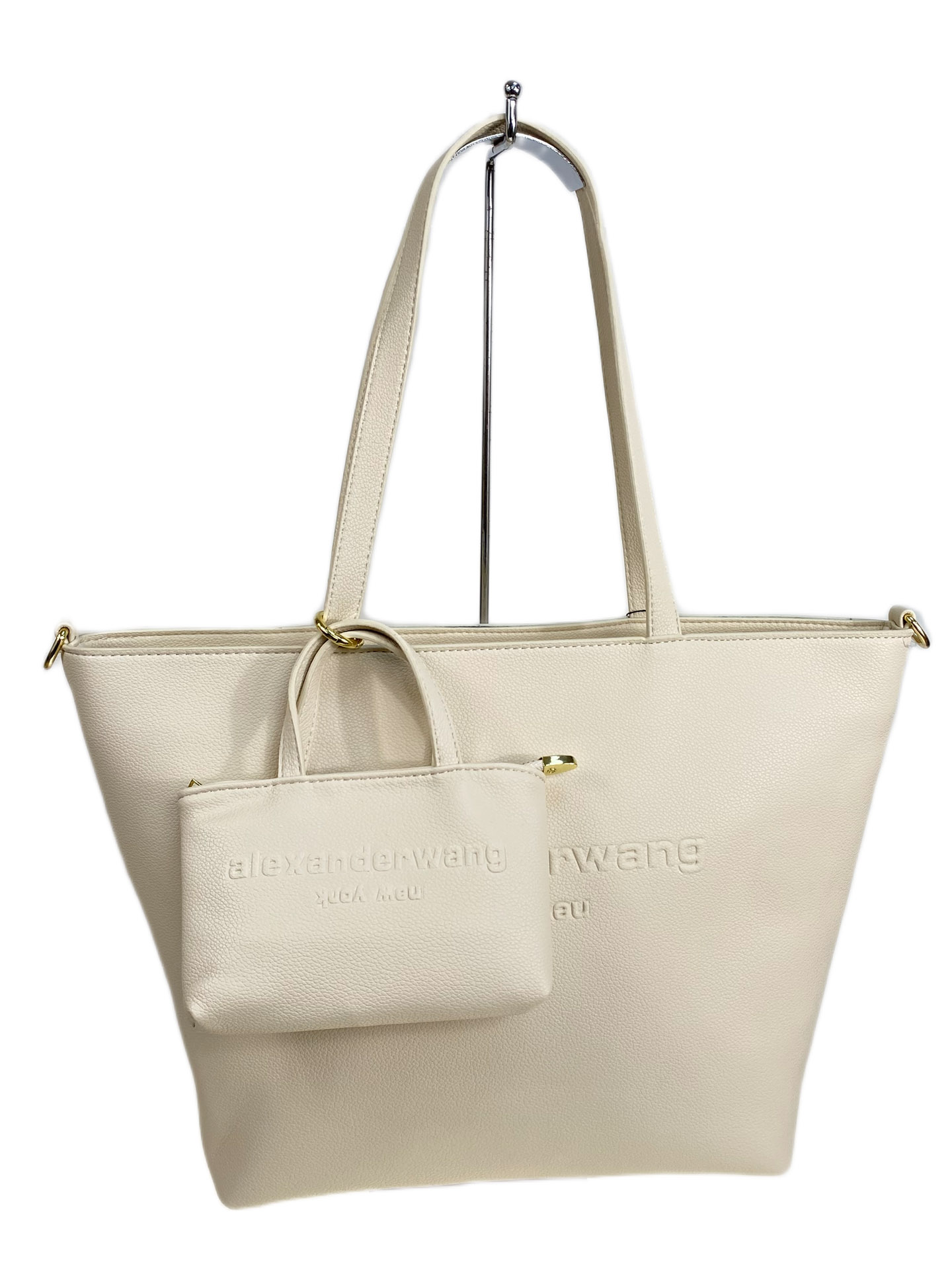 На фото 1 - Женская сумка из искусственной кожи, цвет белый