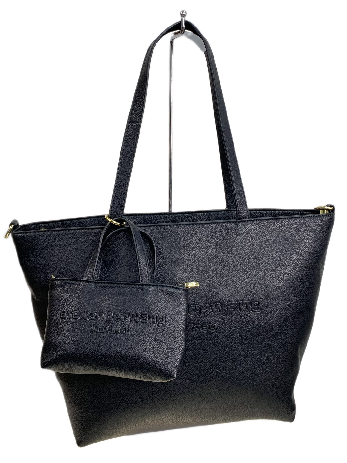 На фото 1 - Женская сумка из искусственной кожи, цвет черный