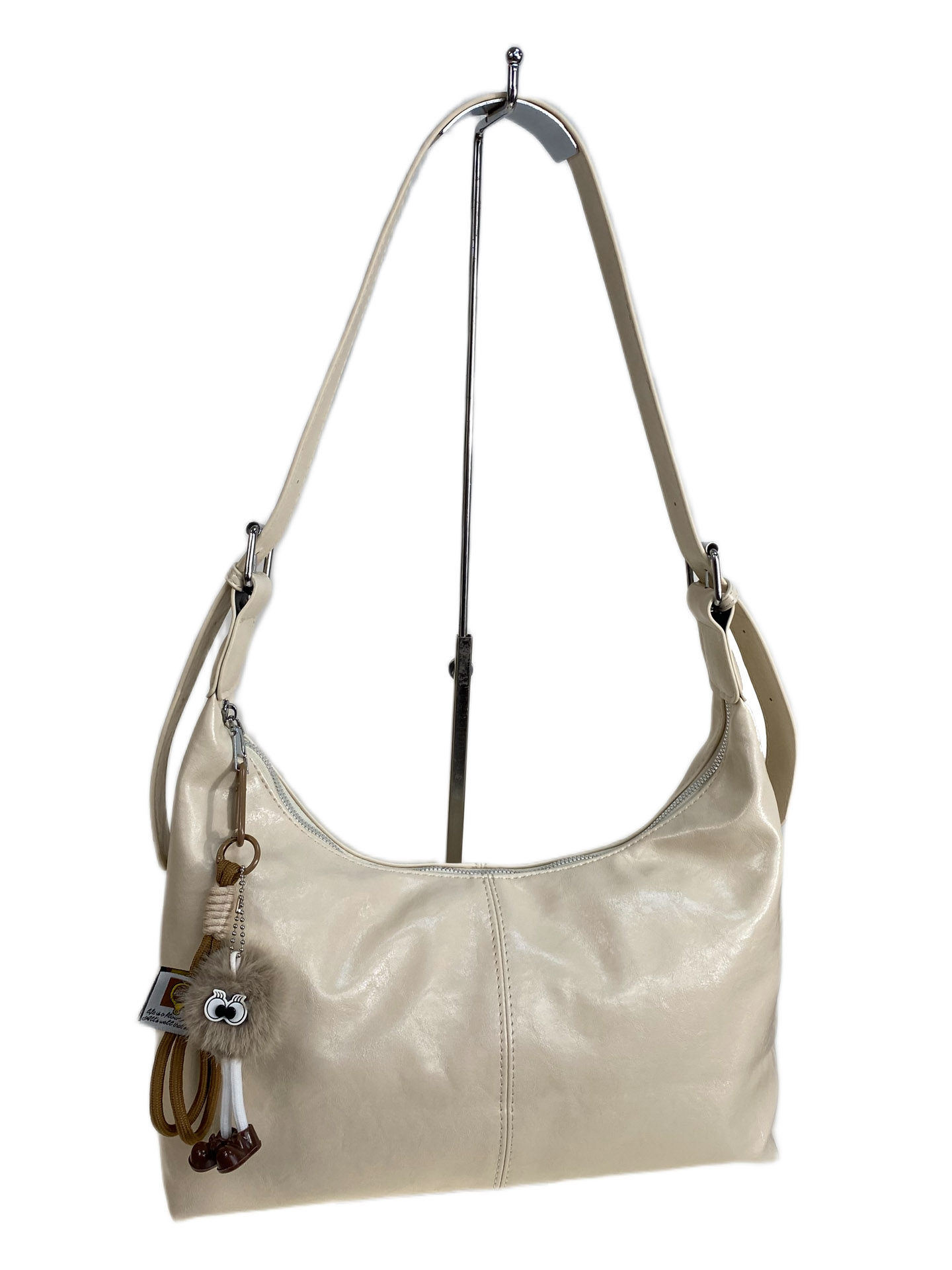 На фото 1 - Женская сумка из искусственной кожи, цвет молочный