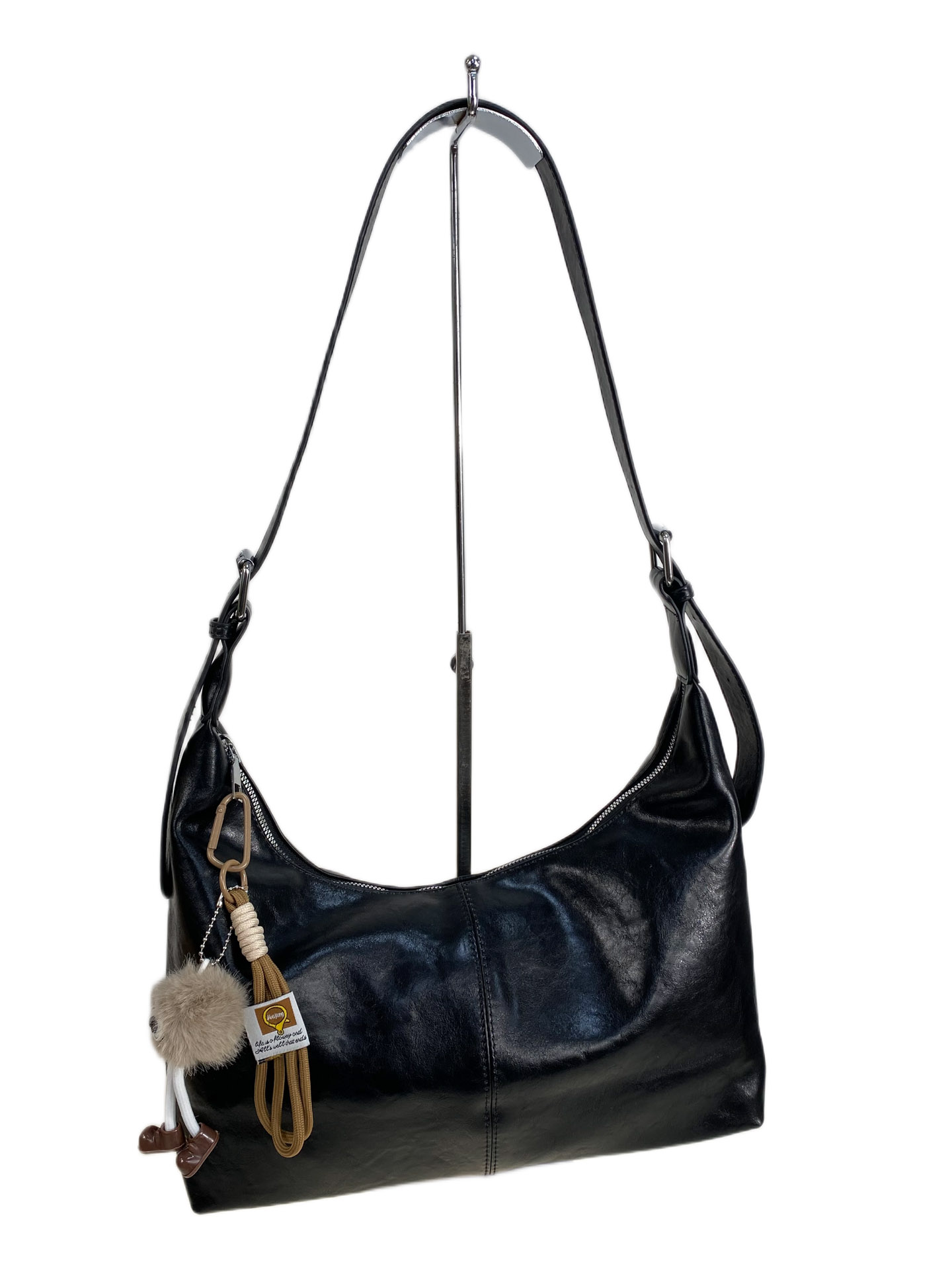 На фото 1 - Женская сумка из искусственной кожи, цвет черный 