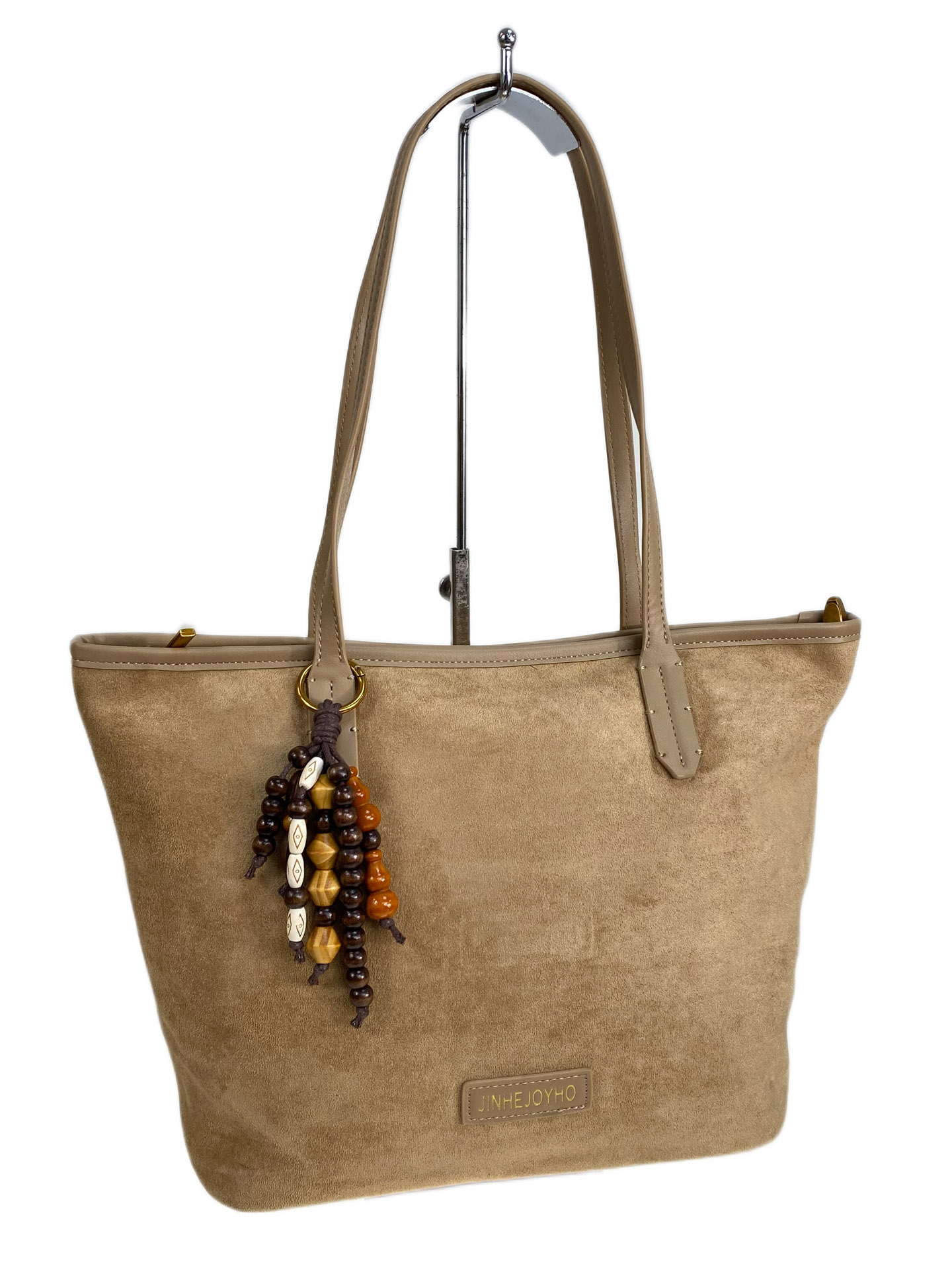 На фото 1 - Женская сумка из искусственной замши, цвет светло коричневый